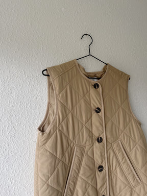 Global funk quilted vest
